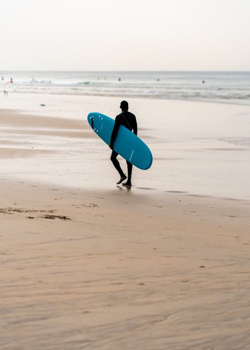 man, beach, surf-7816702.jpg